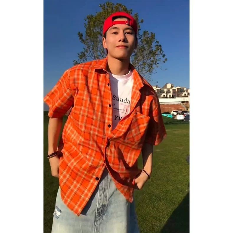 O1CN01IcFzCW1twTyhlc752_2219499975966-0-cib.jpg Orange Plaid Short Sleeve Shirt - Image 1