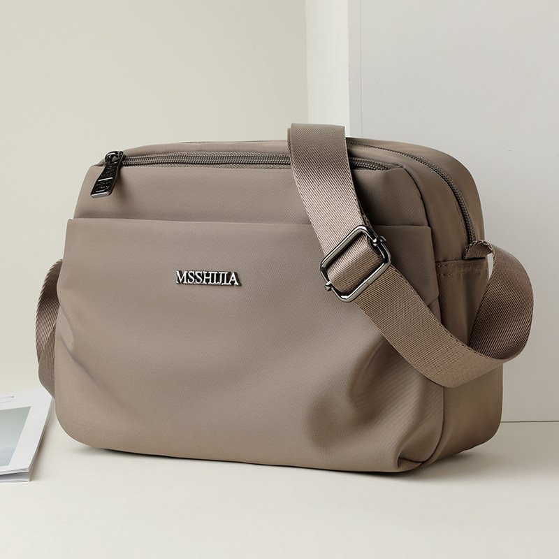 O1CN01Y1pQPG1QQJHmx0Iia_2214098651970-0-cib.jpg Multi-Layer Crossbody Bag - Image 1