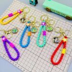 Milk Dragon Beaded Bracelet Keychain - Image 2